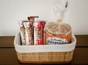 a basket filled with different types of chocolates at Aris Amsterdam in Amsterdam