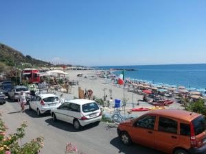 a group of cars parked at a beach at Hotel Mareblu in Amantea