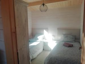 Llit o llits en una habitació de WOODHOUSE