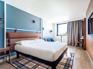 Krevet ili kreveti u jedinici u objektu ibis Styles Castelnaudary