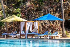 Poolen vid eller i närheten av PrideInn Flamingo Beach Resort & Spa Mombasa