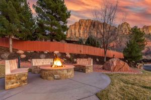 a fire pit in the middle of a park at Best Western Plus Zion Canyon Inn & Suites in Springdale