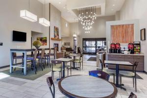 a restaurant with tables and chairs in a room at Best Western Plus Zion Canyon Inn & Suites in Springdale