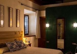 Una cama o camas en una habitación de Molino La Nava