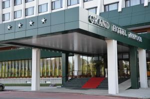 a building with a sign that reads grand hotel africa at Grand Hotel Napoca in Cluj-Napoca