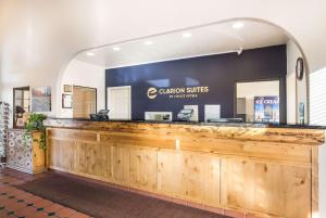 a bar at a restaurant with a sign that says albuquerque suites at Clarion Suites St George - Convention Center Area in St. George