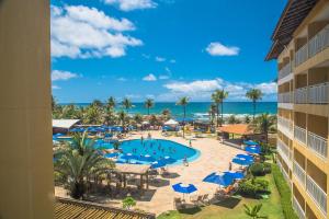 a view of the pool and beach at the resort at Gran Hotel Stella Maris Urban Resort & Conventions in Salvador