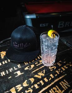 a hat and a drink with a banana in a glass at Plaza Hotel & Casino in Las Vegas