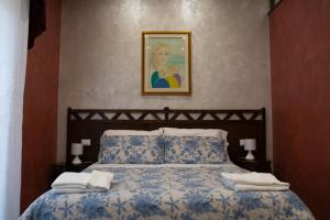 Giường trong phòng chung tại Bed and Breakfast Dolce Noemi