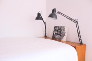 Una cama o camas en una habitación de A Nossa Casa da Costa