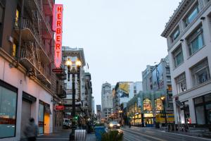 a city street with buildings and cars on the road at Herbert Hotel in San Francisco