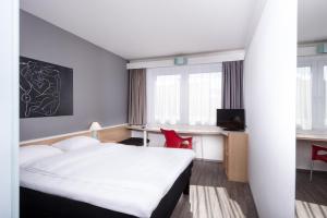 Krevet ili kreveti u jedinici u objektu ibis Berlin City Nord