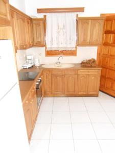 A kitchen or kitchenette at Chrysolithos Kerami Apartments