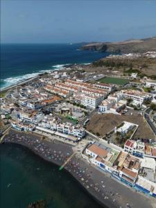 an aerial view of a town next to the ocean at Alojamientos Agaete Pueblo Nº4 y Nº5 in Agaete