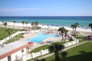 a view of the beach from the balcony of a resort at El Matador 454 - Beautiful views of the Gulf and pool - Includes seasonal beach service! in Fort Walton Beach