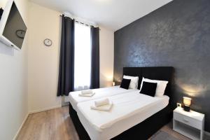 Krevet ili kreveti u jedinici u objektu Virtus Apartments and Rooms with Free Private Parking