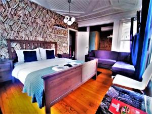 Giường trong phòng chung tại Dreamers V&V Hotel Cihangir