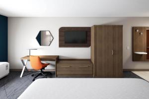 Cama ou camas em um quarto em Holiday Inn Express - Starke, an IHG Hotel