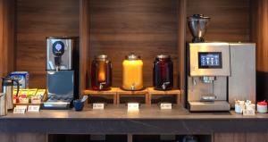 a counter with different types of appliances on it at Holiday Inn Sunderland - City Centre, an IHG Hotel in Sunderland