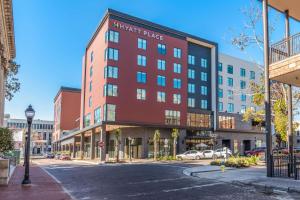 a rendering of the front of the harriott place hotel at Hyatt Place Gainesville Downtown in Gainesville