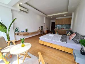 Un lugar para sentarse en HOLO BEN THANH SAIGON Serviced HomeStay