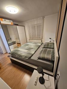 Krevet ili kreveti u jedinici u objektu Apartman Cresnar