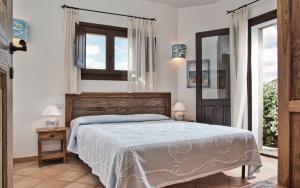 A bed or beds in a room at Vistamare Grande Pevero