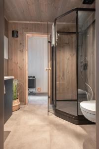 A bathroom at Luxury Nordic Suite with Private Sauna and Panoramic Mountain Views