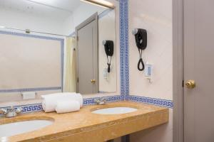 Un baño de B&B HOTEL Sado Setúbal