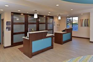 a lobby of a hospital with a waiting room at Homewood Suites by Hilton Cincinnati/Mason in Mason