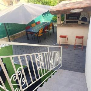 Balkon ili terasa u objektu Joli haut de villa 3 chambres climatisé avec jacuzzi