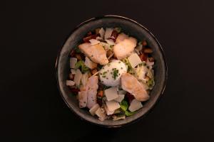 a bowl of food with meat and vegetables in it at Aloft Strasbourg Etoile in Strasbourg