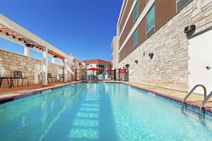 Poolen vid eller i närheten av Home2 Suites By Hilton Abilene, TX