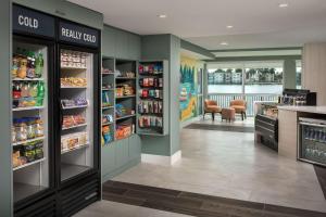 a grocery store aisle with food and drinks at Tru By Hilton Miami Airport South Blue Lagoon, Fl in Miami