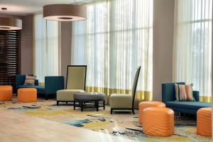 Uma área de estar em SpringHill Suites by Marriott Orlando Theme Parks Lake Buena Vista