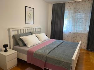 A bed or beds in a room at Apartment in the city center