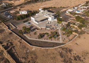 an aerial view of a house in the desert at Alma Calma Hotel Rural in Tindaya