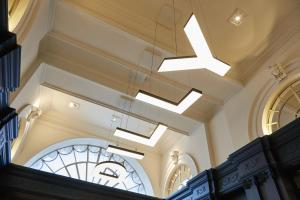 a chandelier hanging from the ceiling of a building at The Dilly in London