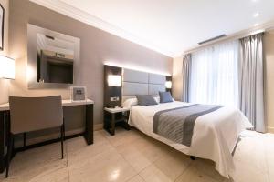 Katil atau katil-katil dalam bilik di Habitus Hotel Europa