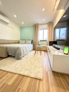 Ліжко або ліжка в номері Lisbon Luxury Studio