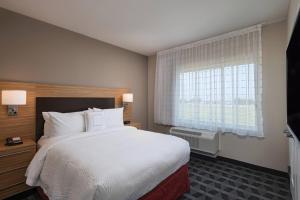 Posteľ alebo postele v izbe v ubytovaní TownePlace Suites by Marriott Dallas DFW Airport North/Irving