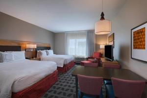 Posteľ alebo postele v izbe v ubytovaní TownePlace Suites by Marriott Dallas DFW Airport North/Irving