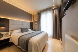 Katil atau katil-katil dalam bilik di Habitus Hotel Europa