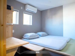 Tempat tidur dalam kamar di Kita-Kamakura 520