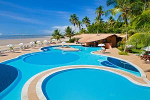 Piscina a Hotel Karapitangui o a prop