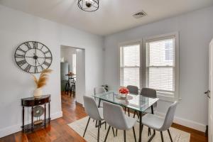 a dining room with a glass table and chairs at Atlantic City Home about 2 Mi to Ocean Casino Resort! in Atlantic City