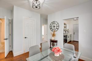 a dining room with a glass table and chairs at Atlantic City Home about 2 Mi to Ocean Casino Resort! in Atlantic City