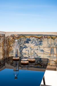 The swimming pool at or close to Memoria Lisboa FLH Hotels