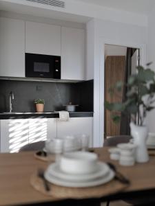 A kitchen or kitchenette at Tembo Barcelona