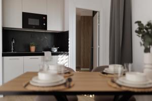 A kitchen or kitchenette at Tembo Barcelona